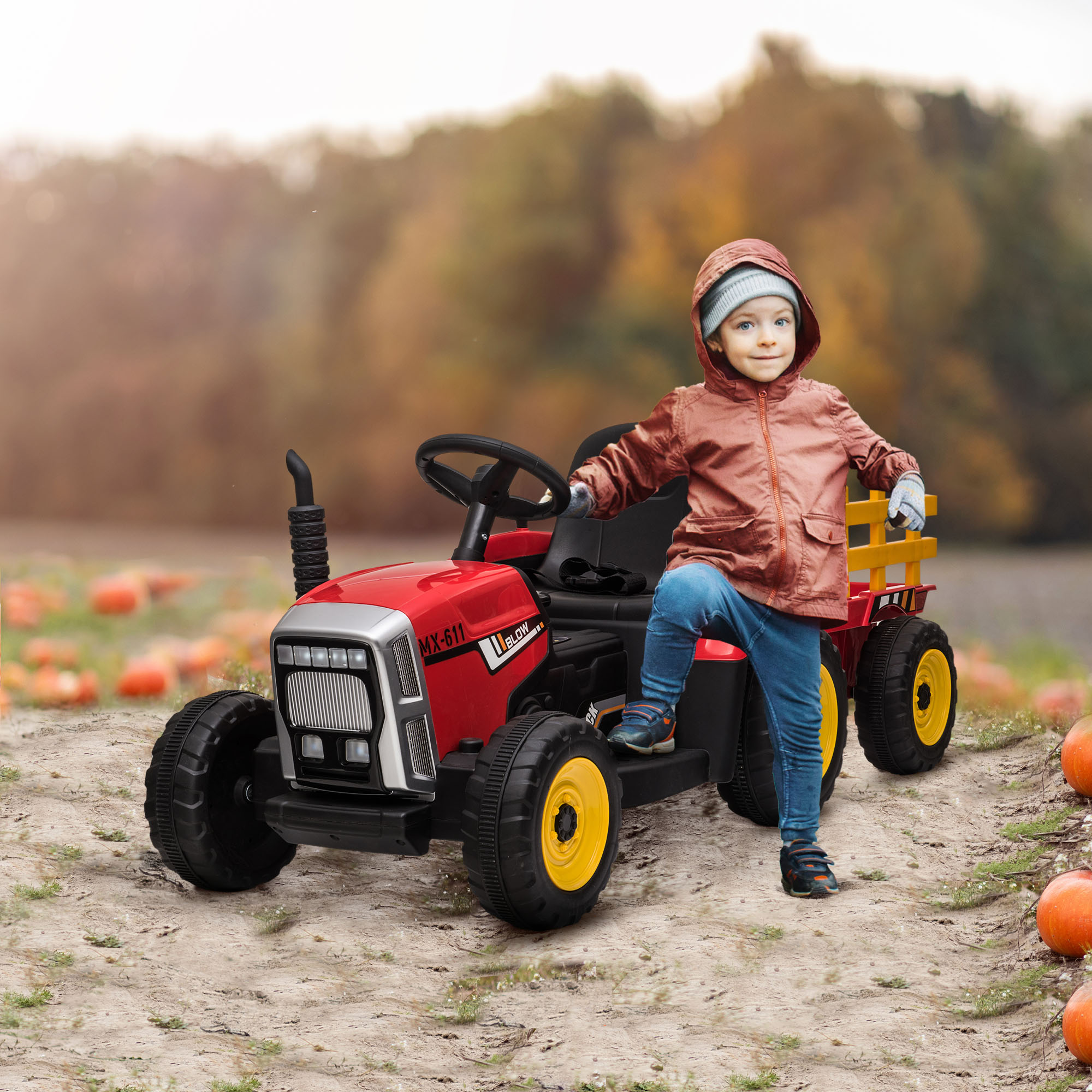 Two little boys having fun in a pumpkin patch