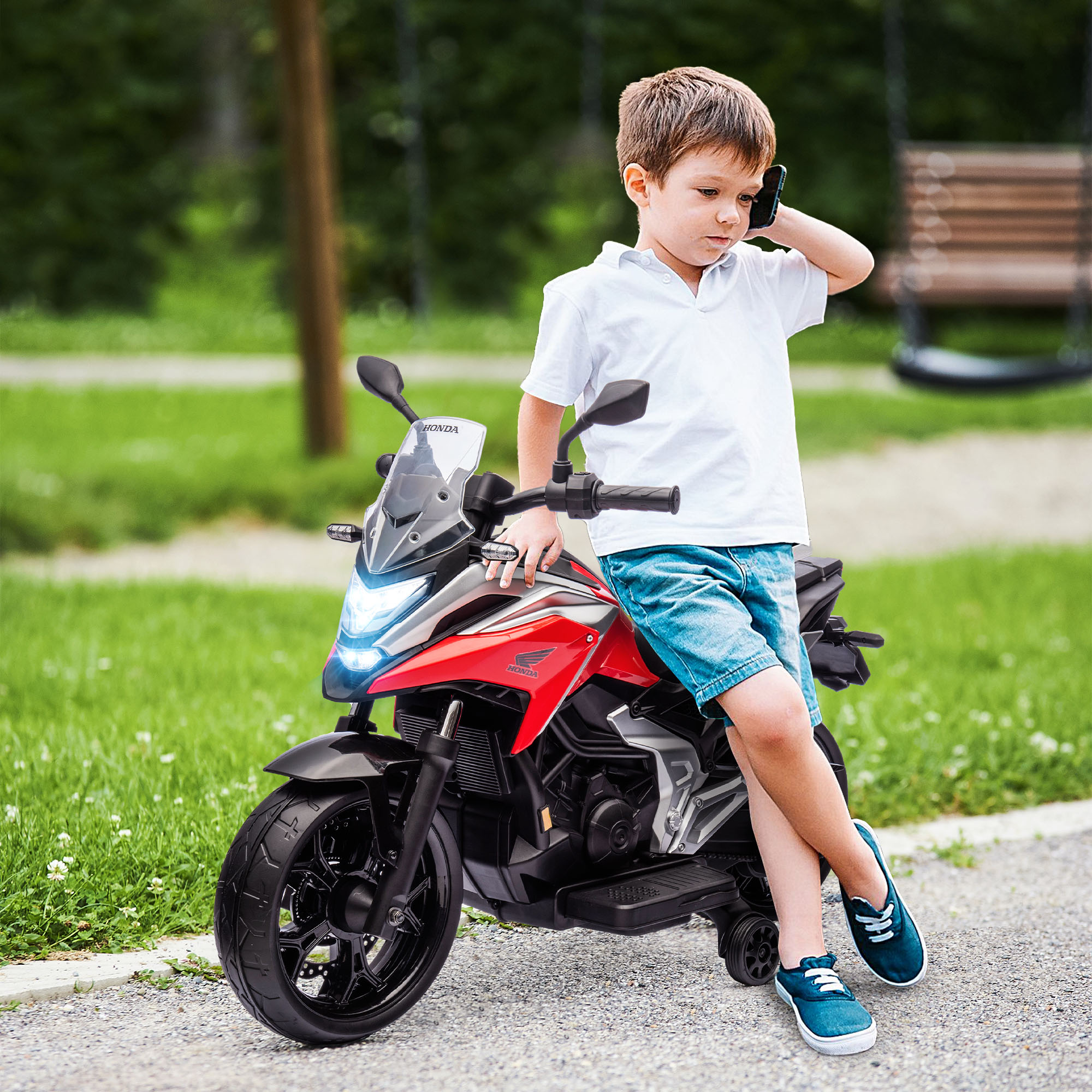 Happy toddler boy riding bike. Kids enjoying a bicycle ride. Spo