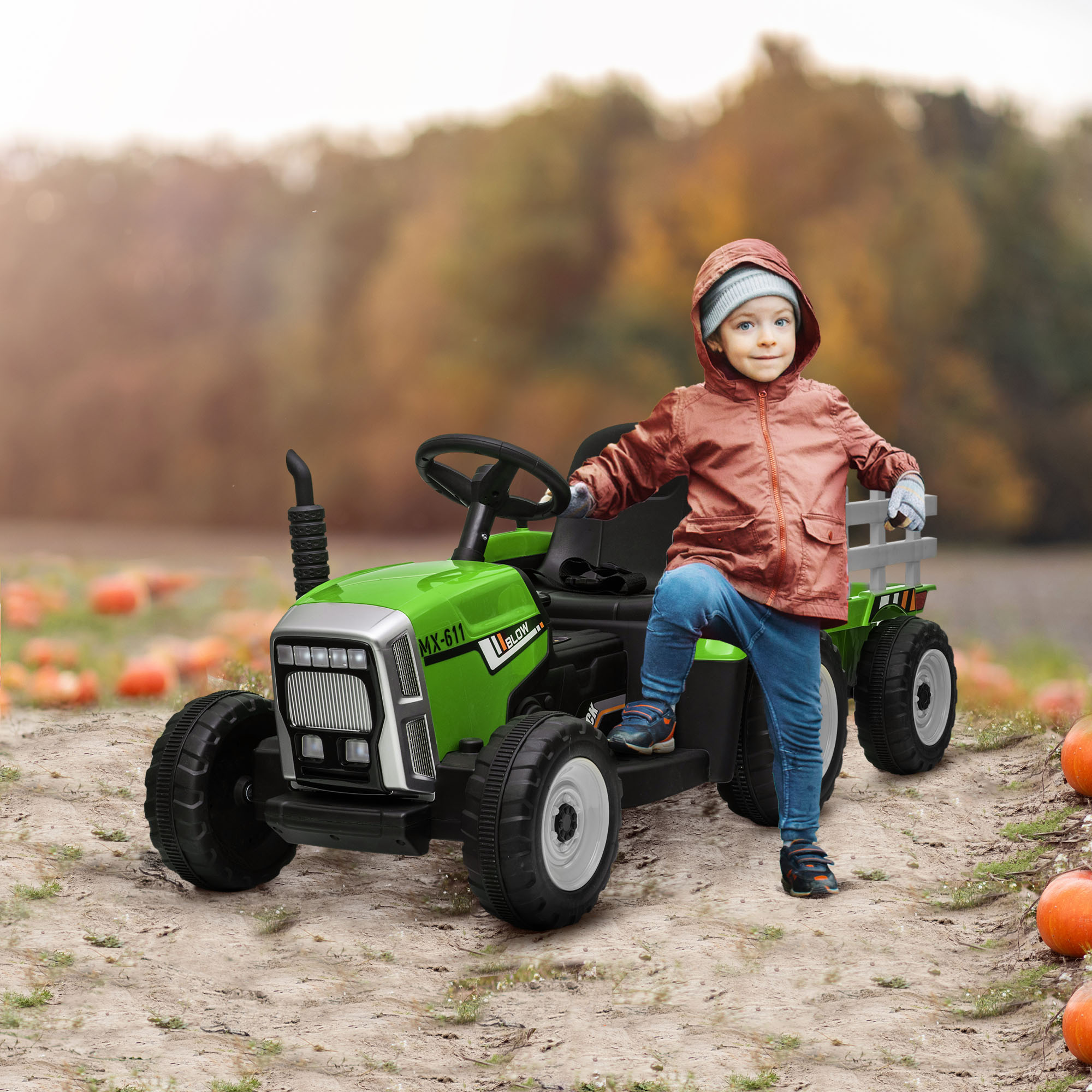 Two little boys having fun in a pumpkin patch