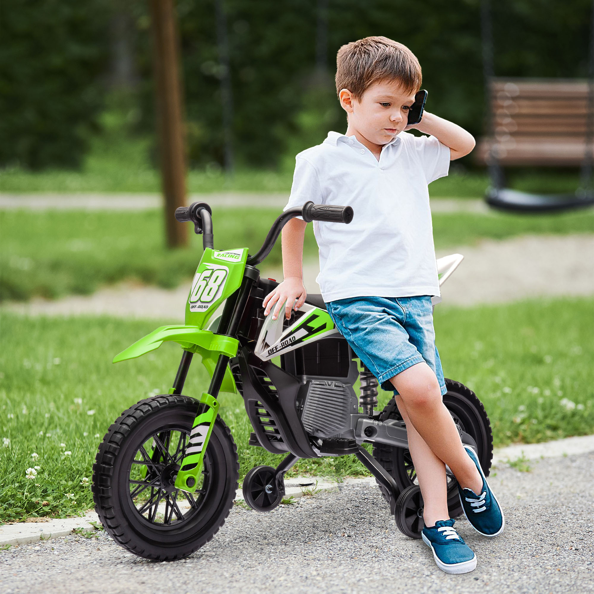 Happy toddler boy riding bike. Kids enjoying a bicycle ride. Spo